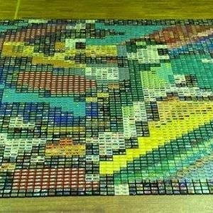 创世界纪录！大佬用4256个FC卡带打造巨大马赛克画